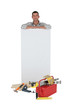 Carpenter with a blank board