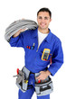 Electrician stood with cabling
