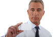 A businessman handing his card.