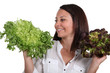 Woman with salad heads