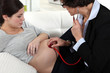 Pregnant woman having check-up
