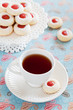 Cup of hot tea and homemade almond cookies