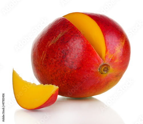 Photo: Ripe appetizing mango isolated on white Ripe appetizing mango isolated on white