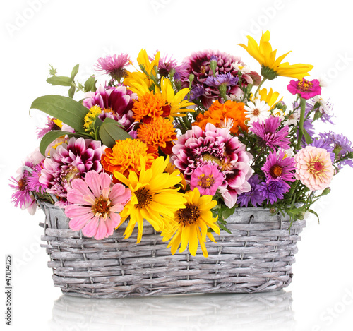 Photo: beautiful bouquet of bright flowers in basket isolated on white beautiful bouquet of bright flowers in basket isolated on white