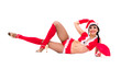 sexy girl wearing santa claus clothes lies