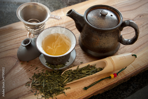 Photo: Cup of green tea and accessories Cup of green tea and accessories