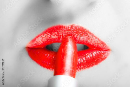 Photo: Close-up of sexy woman lips with red lipstick Close-up of sexy woman lips with red lipstick