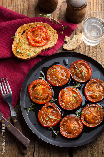 Photo: baked tomatoes with herbs and olive oil baked tomatoes with herbs and olive oil