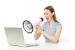 Businesswoman yelling at laptop