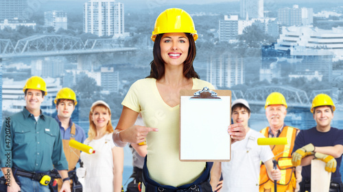 Photo: Contractor woman and group of industrial workers. Contractor woman and group of industrial workers.
