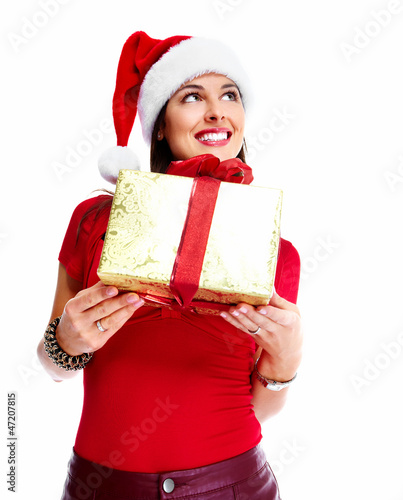 Photo: Christmas santa woman with gift. Christmas santa woman with gift.