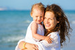 Mother and daughter on the beach