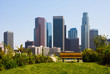 Photo: Skyscrapers in Los Angeles with a bench in a foreground Skyscrapers in Los Angeles with a bench in a foreground