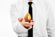 Photo: Golden egg in hand businessman Golden egg in hand businessman