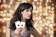 Sexy beautiful young girl in casino on the background bokeh