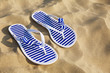 Flip-flops on sand beach