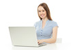Photo: Young woman working on laptop Young woman working on laptop