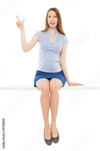 Photo: Young woman pointing Young woman pointing