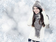 Photo: Beautiful young brunette with winter clothes Beautiful young brunette with winter clothes