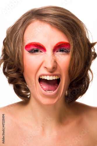 Photo: An angry woman shouting An angry woman shouting