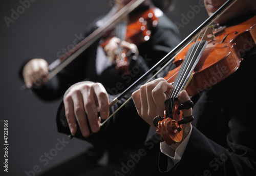 Photo: Classical music. Violinists in concert Classical music. Violinists in concert
