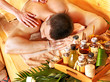 Woman getting bamboo massage.