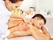 Man getting massage in spa.
