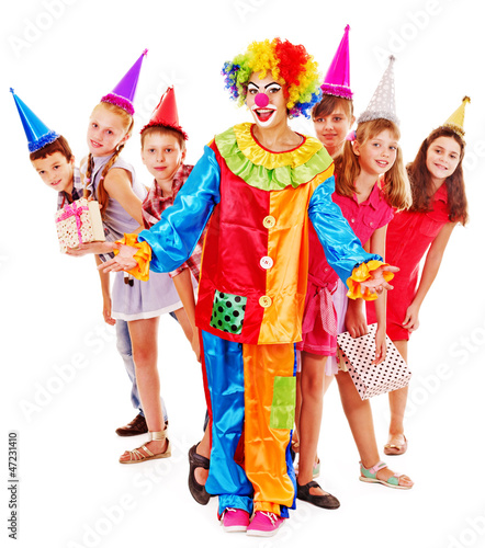 Photo: Birthday party group of teen with clown. Birthday party group of teen with clown.