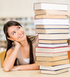 Student with a pile of books
