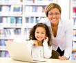 Girl with a computers teacher