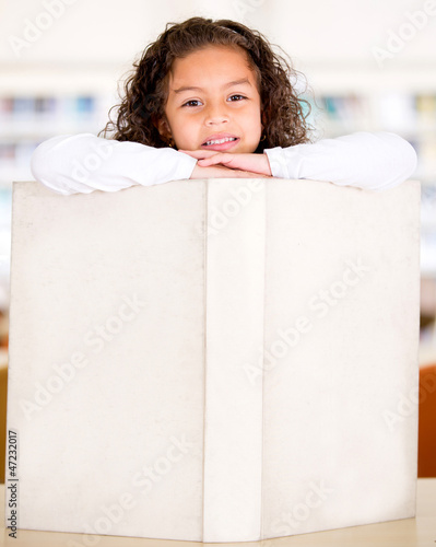 Photo: Schoolgirl with a book Schoolgirl with a book