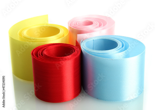 Photo: bright silk ribbons, isolated on white bright silk ribbons, isolated on white