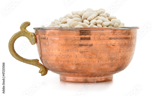 Photo: White kidney beans in an old fashioned bowl White kidney beans in an old fashioned bowl
