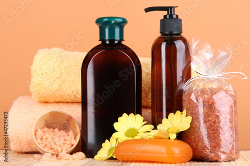 Photo: Set for care of a body on peach background Set for care of a body on peach background