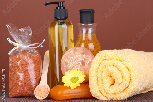 Photo: Set for care of a body on brown background Set for care of a body on brown background