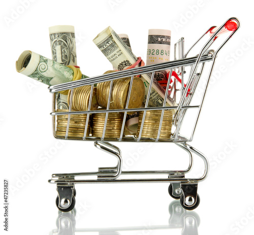 Photo: shopping trolley with dollars and Ukrainian coins, isolated shopping trolley with dollars and Ukrainian coins, isolated