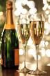 Glasses of champagne and bottle