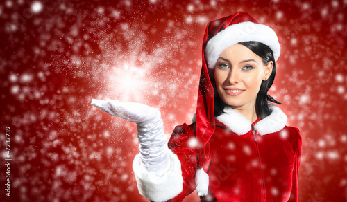 Photo: Portrait of girl wearing santa claus clothes Portrait of girl wearing santa claus clothes
