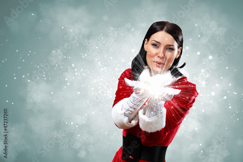 Photo: Portrait of girl wearing santa claus clothes Portrait of girl wearing santa claus clothes