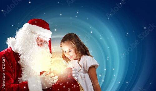 Photo: portrait of santa claus with a girl portrait of santa claus with a girl