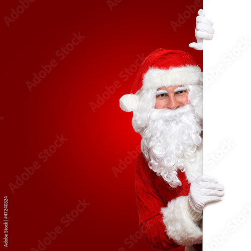 Photo: Weihnachtsmann mit rotem Hintergrund Weihnachtsmann mit rotem Hintergrund