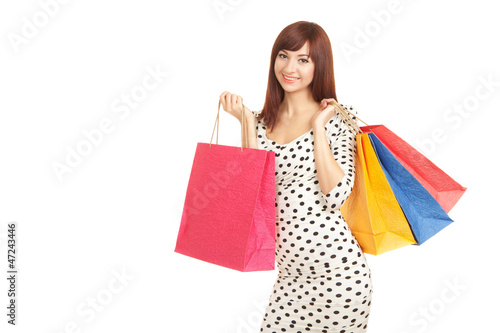 Photo: Pretty woman with shopping bags Pretty woman with shopping bags