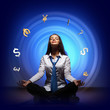 Business woman with financial symbols around