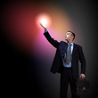 Businessman with light shining
