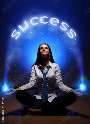 Photo: young businesswoman and success word young businesswoman and success word