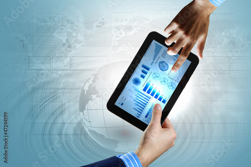 Photo: Modern computer technology in business Modern computer technology in business