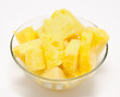 Pineapple chunks in the bowl isolated