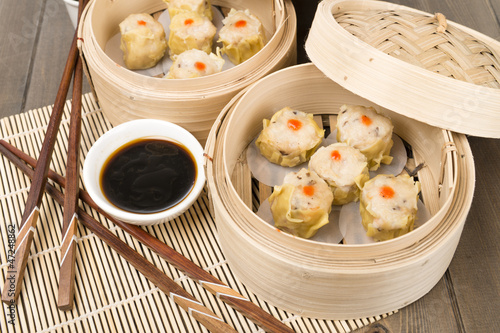 Photo: Siu Mai - Chinese pork and shrimp dumplings in bamboo steamers Siu Mai - Chinese pork and shrimp dumplings in bamboo steamers