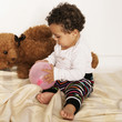 Photo: Kleinkind und Teddybär Kleinkind und Teddybär
