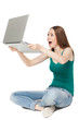 Photo: Excited female holding laptop Excited female holding laptop